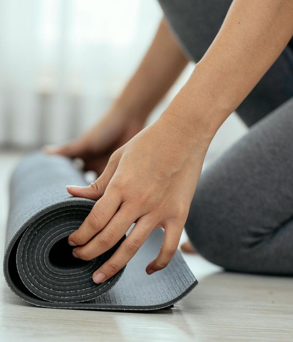 A serene setting with a yoga mat ready for practice.